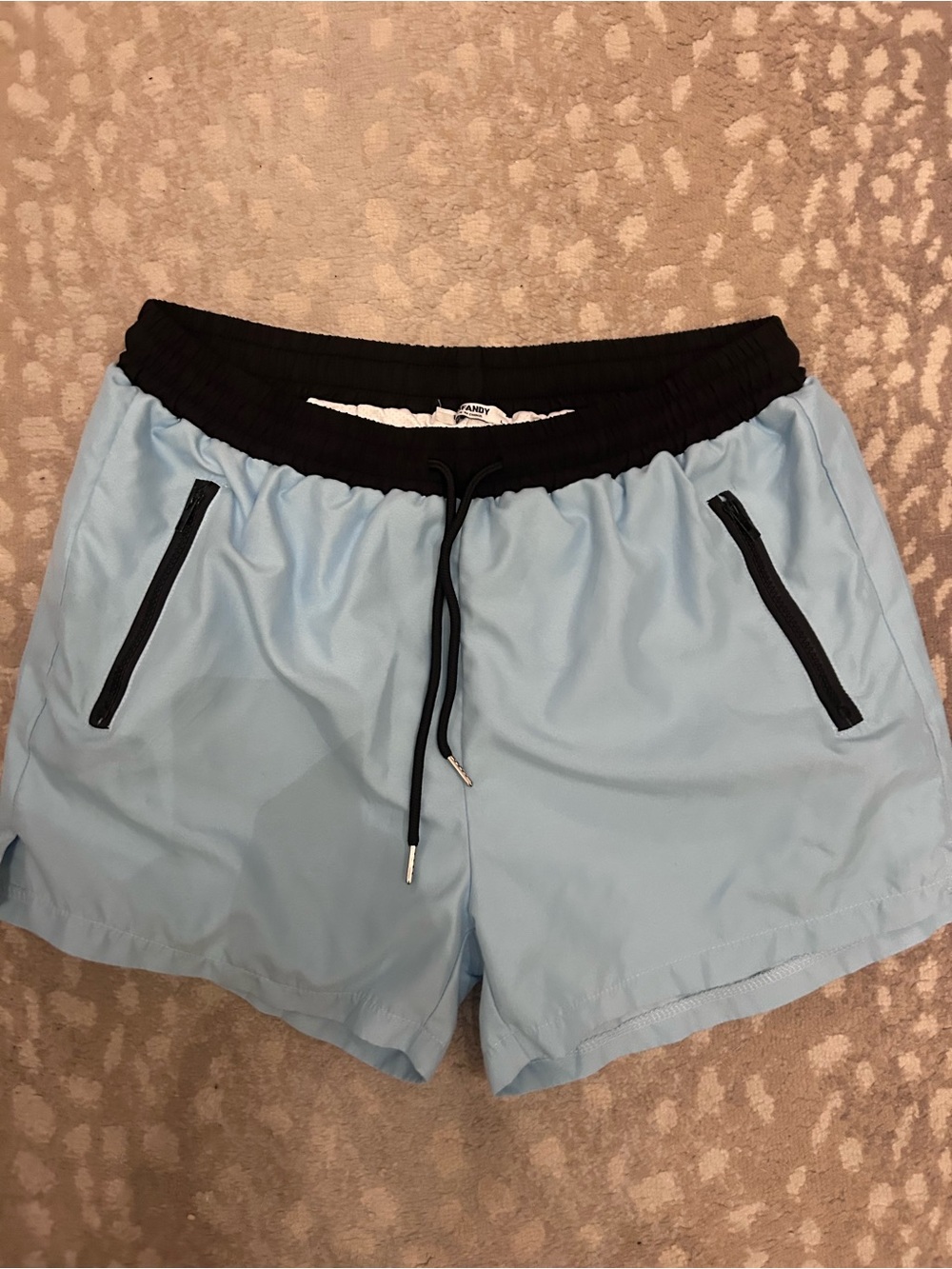 Men's Light Blue Swim Trunks with Black Waistband and Zipper Pockets